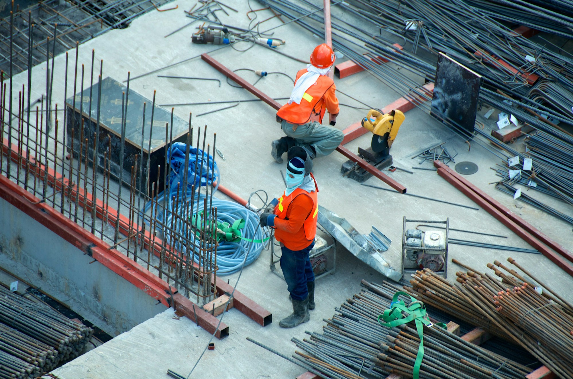 Construction crew working on a framed structure